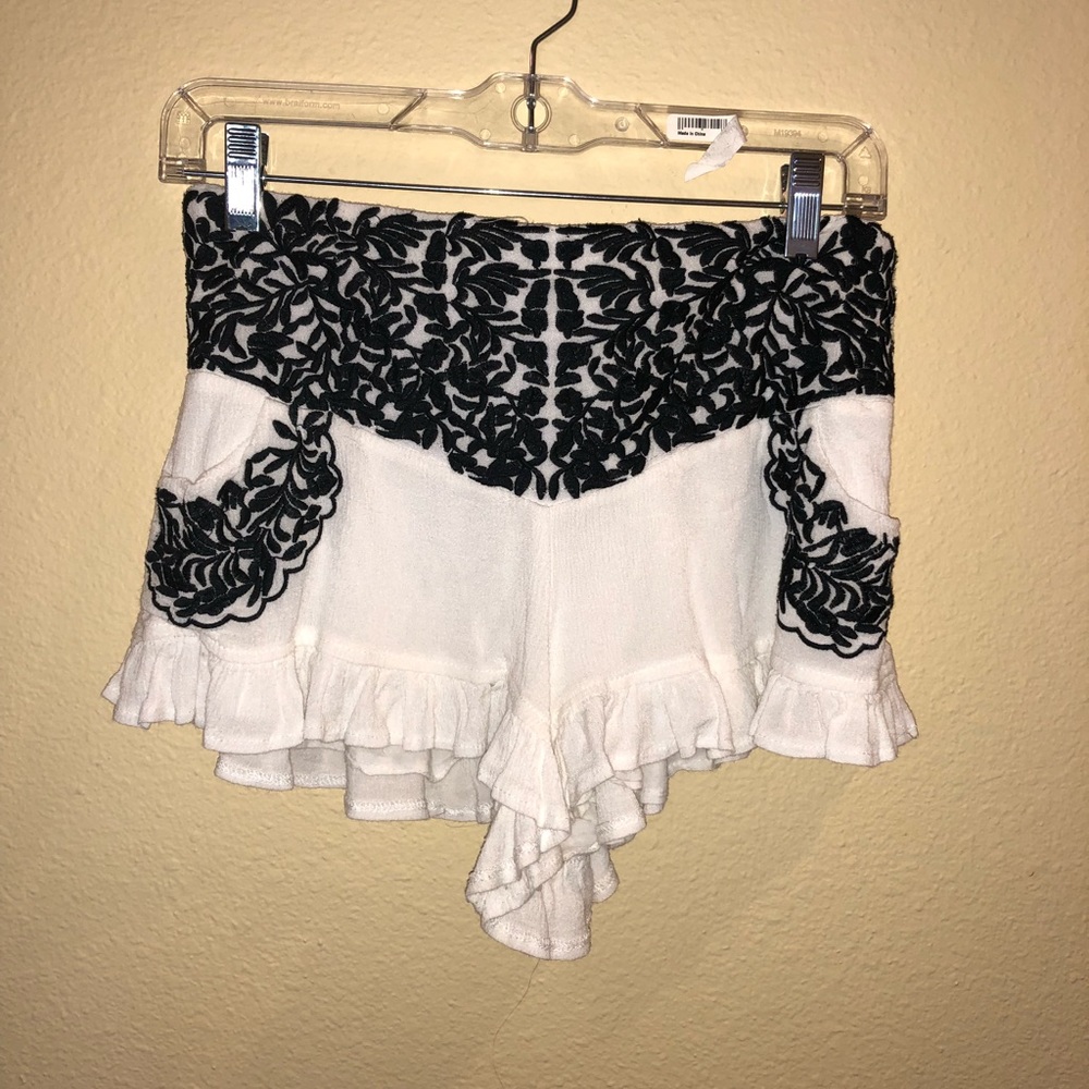 White and blue embroidered shorts